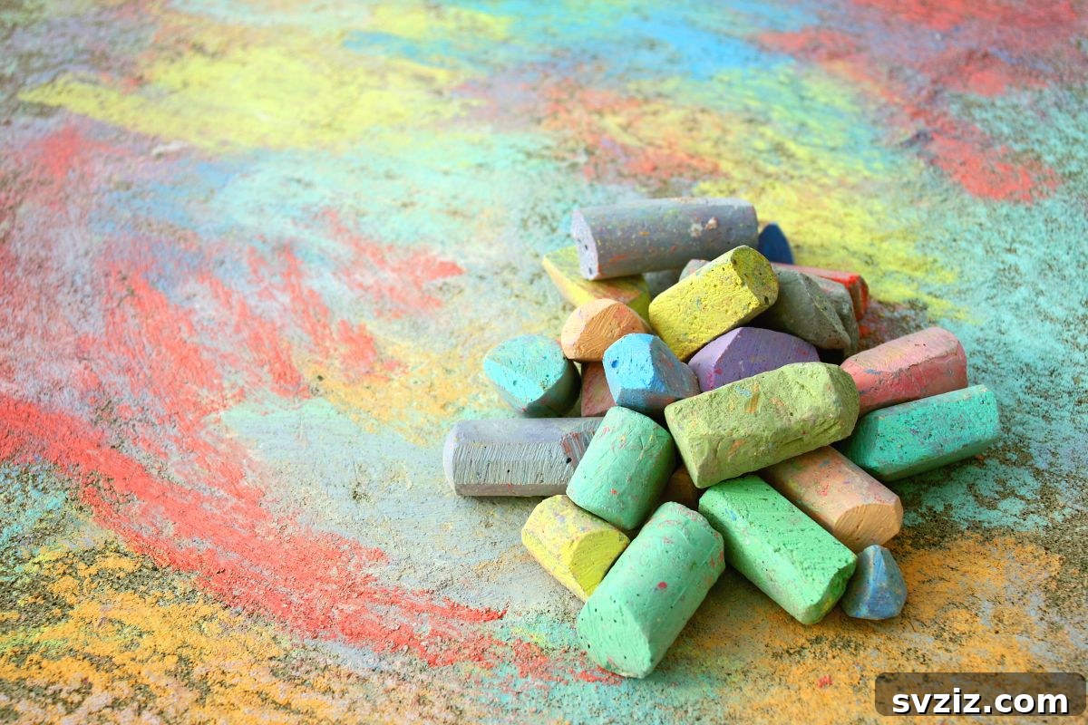 Little Explorers: 41 Outdoor Play Ideas for Preschoolers 7 Colorful sidewalk chalk paint designs on a driveway