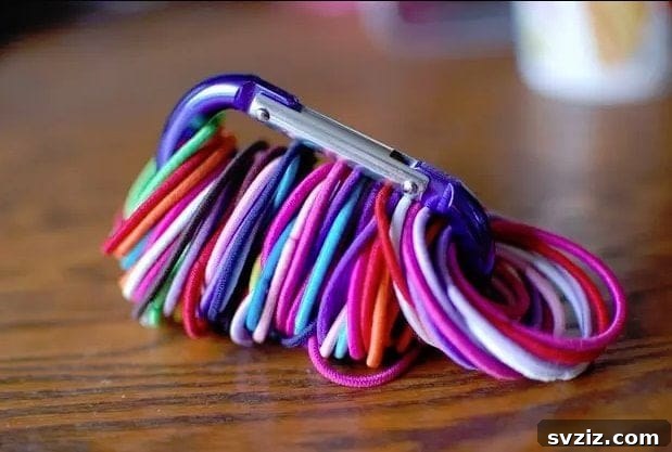 Keyring holding multiple hair elastics
