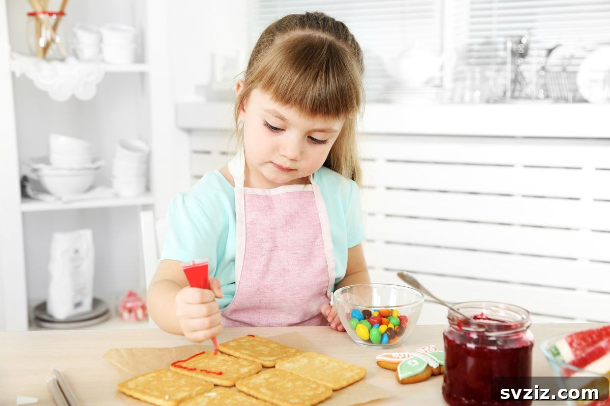 Kids decorating cookies with colorful icing and sprinkles