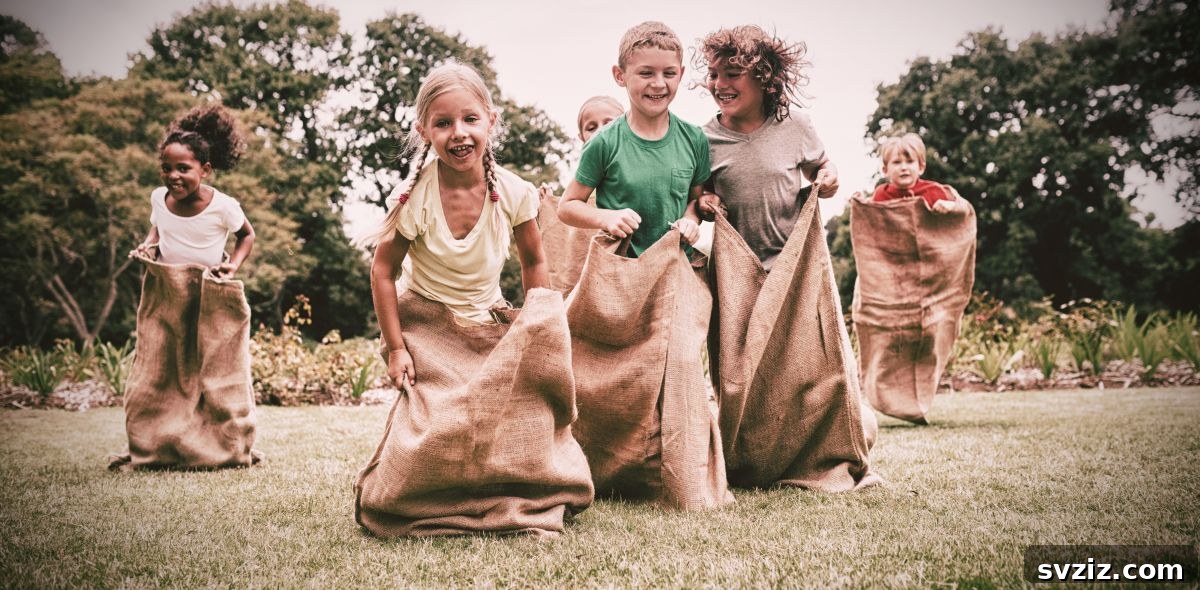 Kids jumping in sacks during a potato sack race