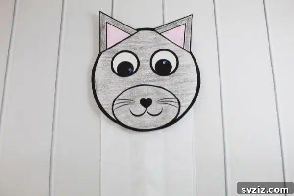 Easy paper bag cat puppet with printable template