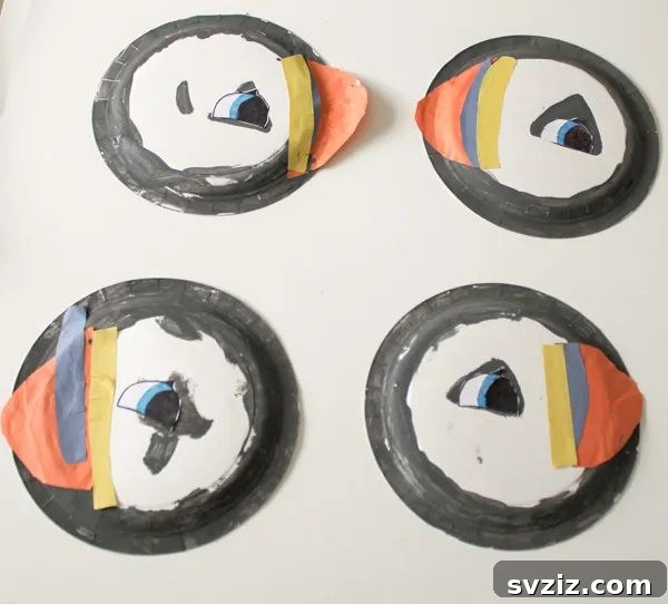 Charming paper plate puffin craft inspired by Oona