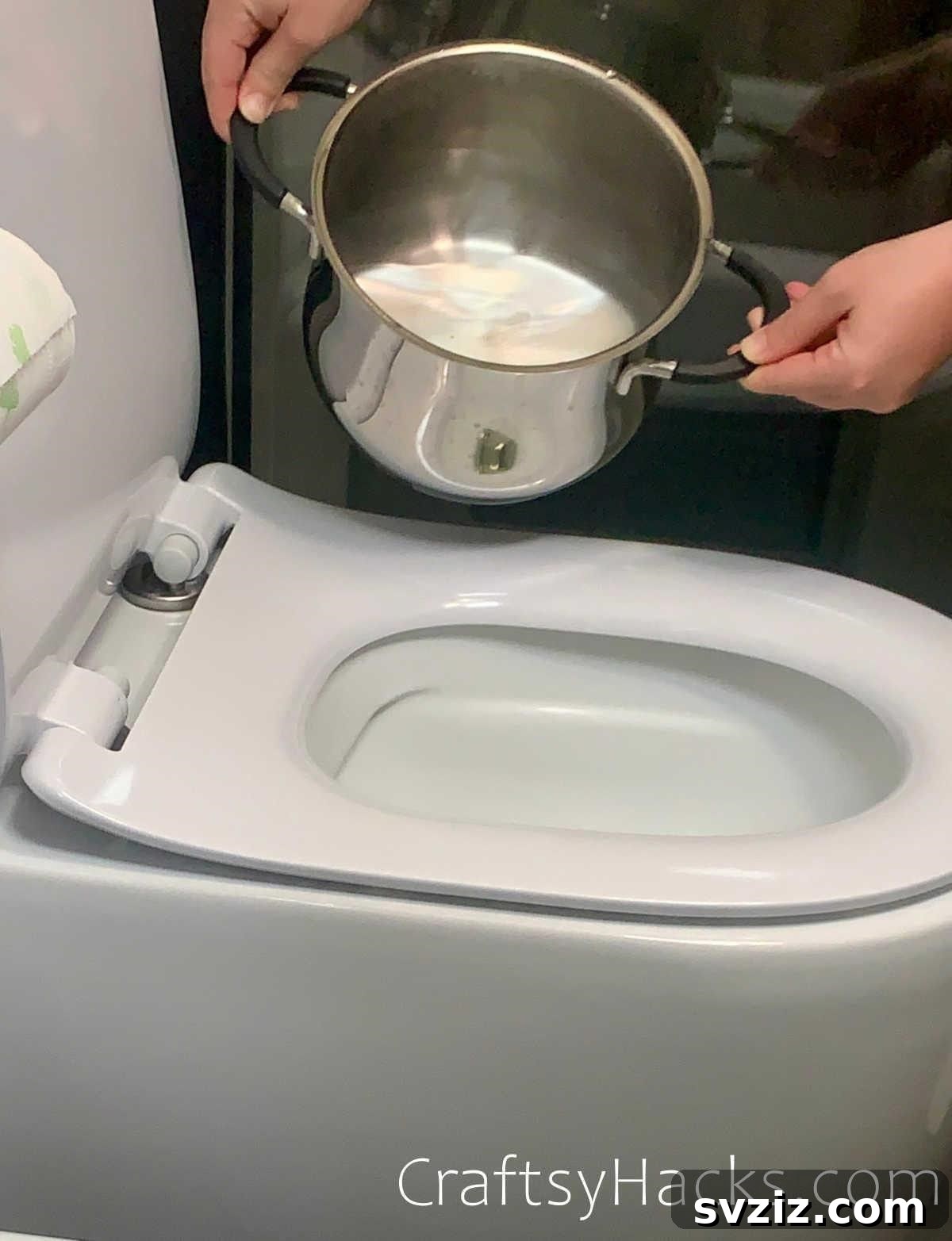Unclog toilet with dish soap and hot water