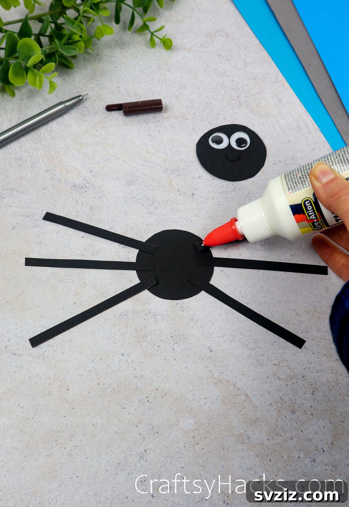 Spin a Web of Fun: Easy Paper Spider Craft 16 glue legs onto body