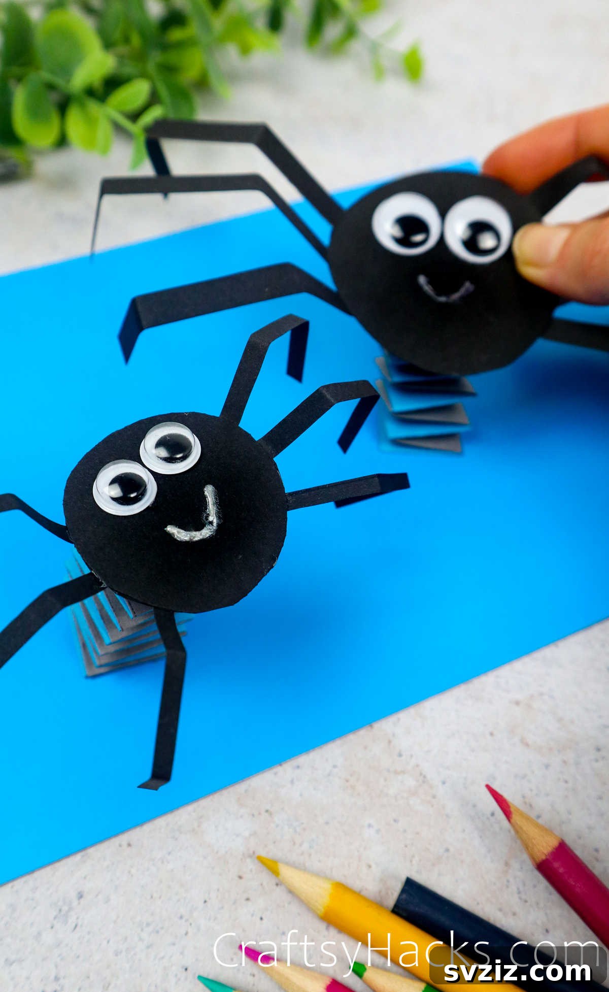 Spin a Web of Fun: Easy Paper Spider Craft 4 two paper spiders
