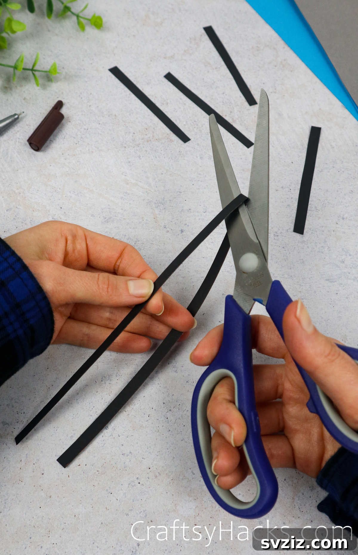 Spin a Web of Fun: Easy Paper Spider Craft 8 cut black stripes into four pieces