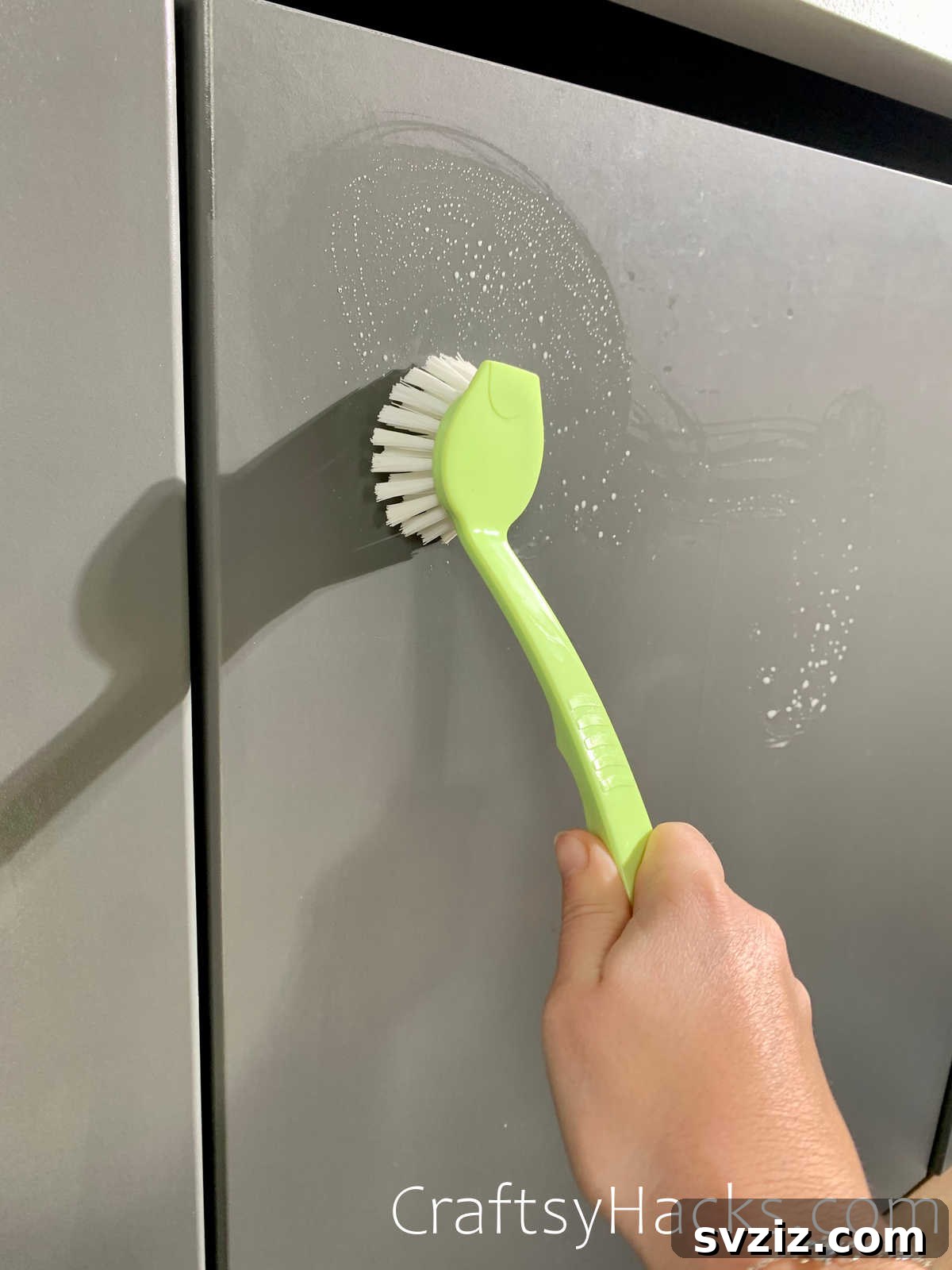 scrub front of kitchen cabinets