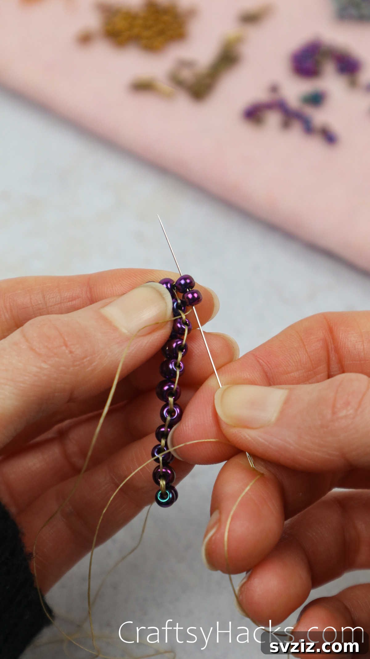 Craft Your Own Beaded Earrings 27 New beads threaded from the underside, starting to form a diamond shape.