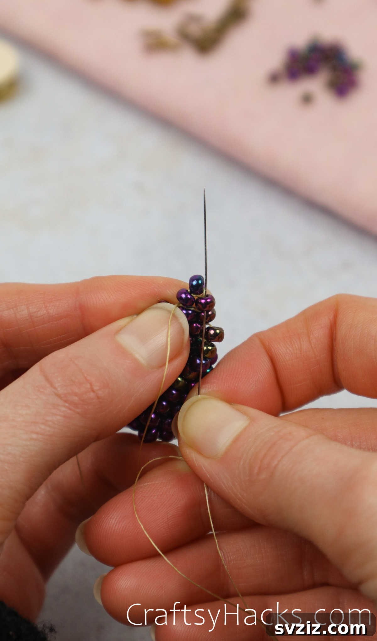 Craft Your Own Beaded Earrings 42 The top beads of the triangle being secured with additional threading.