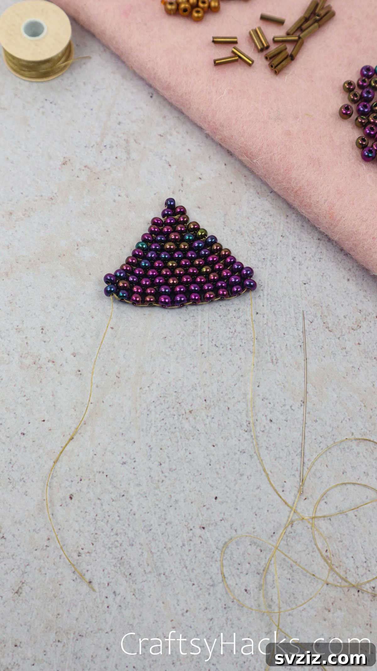 Craft Your Own Beaded Earrings 46 A reference point shot showing the secured triangle and thread tails.