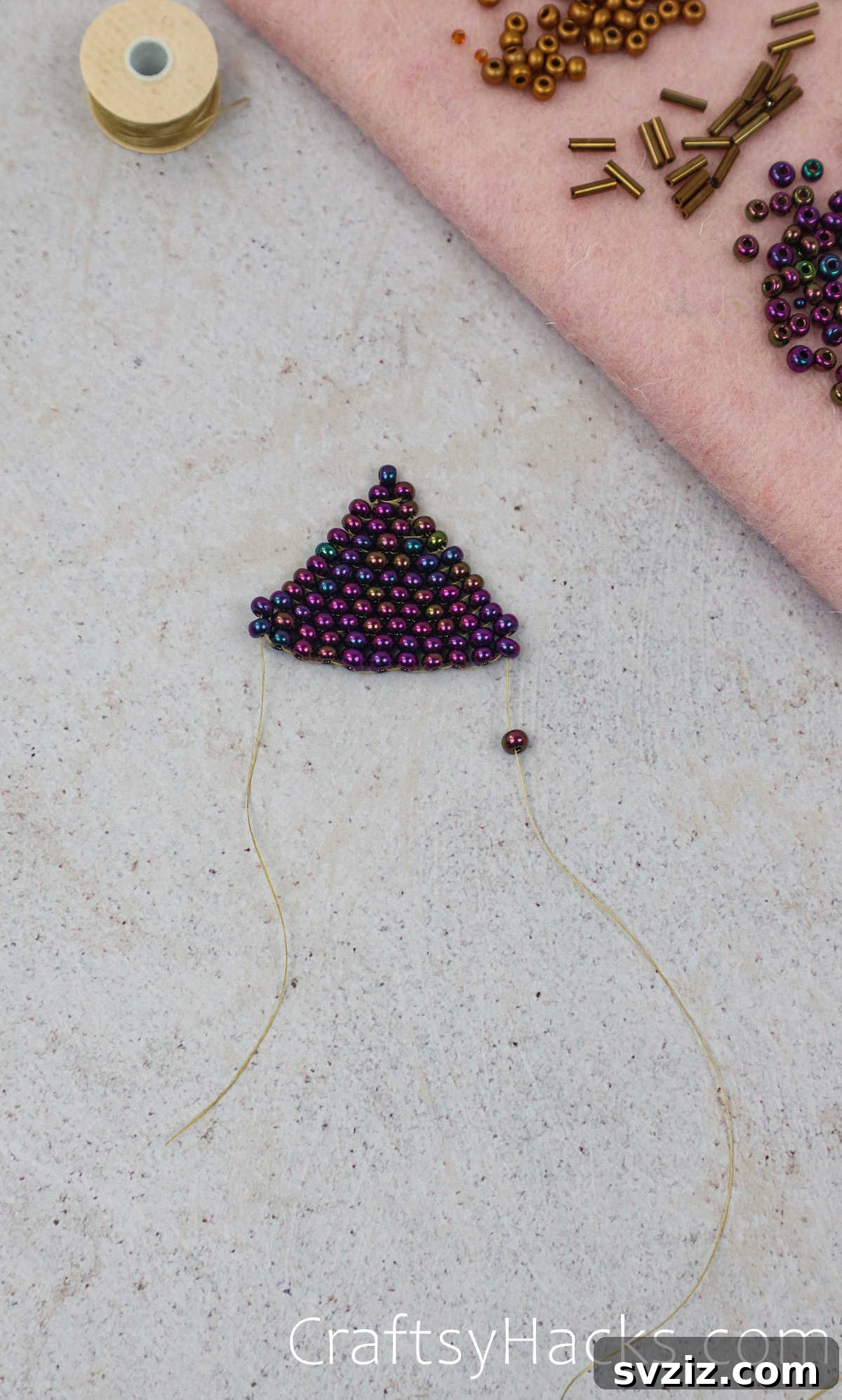 Craft Your Own Beaded Earrings 47 First fringe strands added to the bottom of the beaded earring.