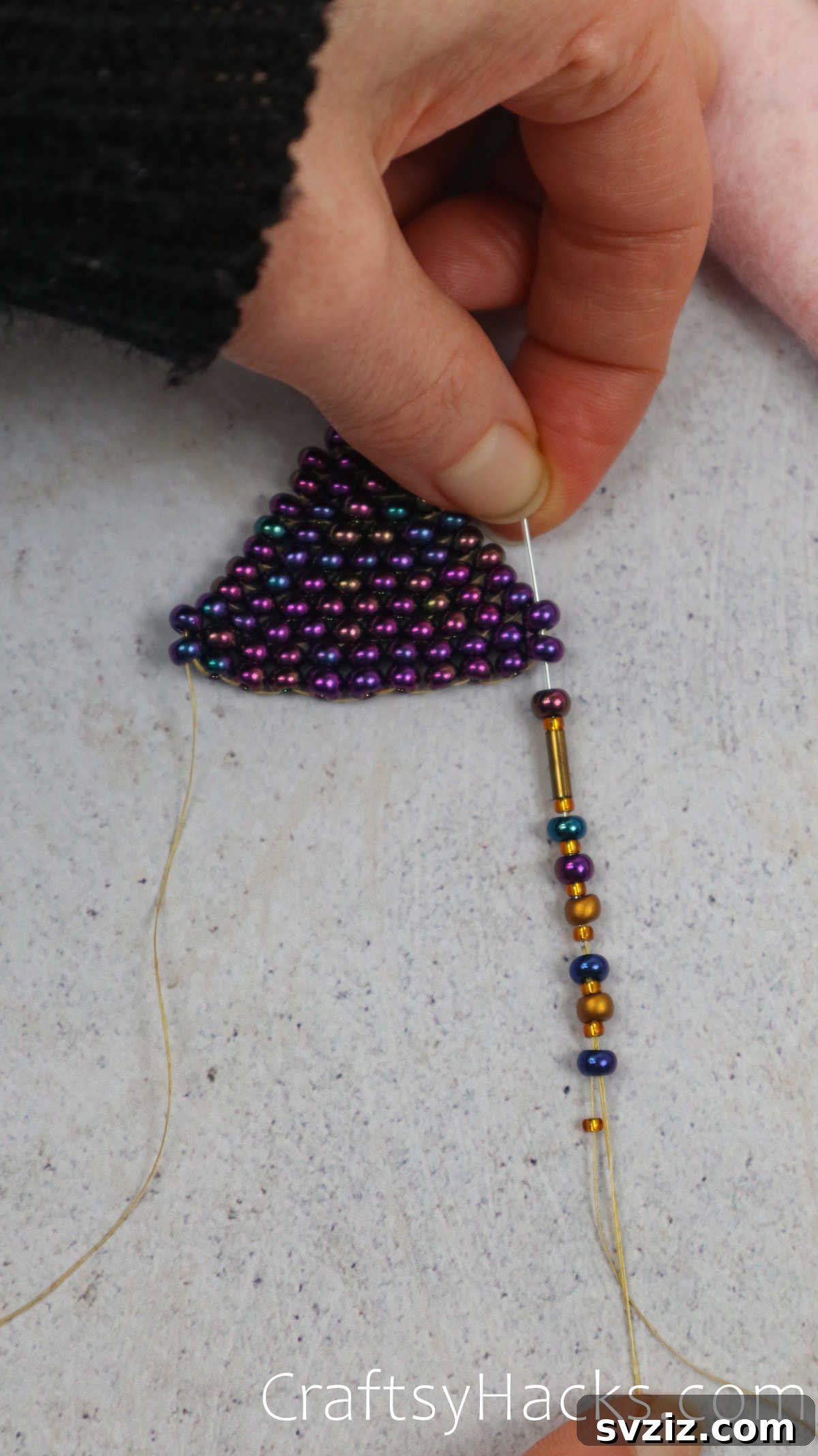 Craft Your Own Beaded Earrings 50 Beading needle threading up through the fringe, securing it to the main earring.