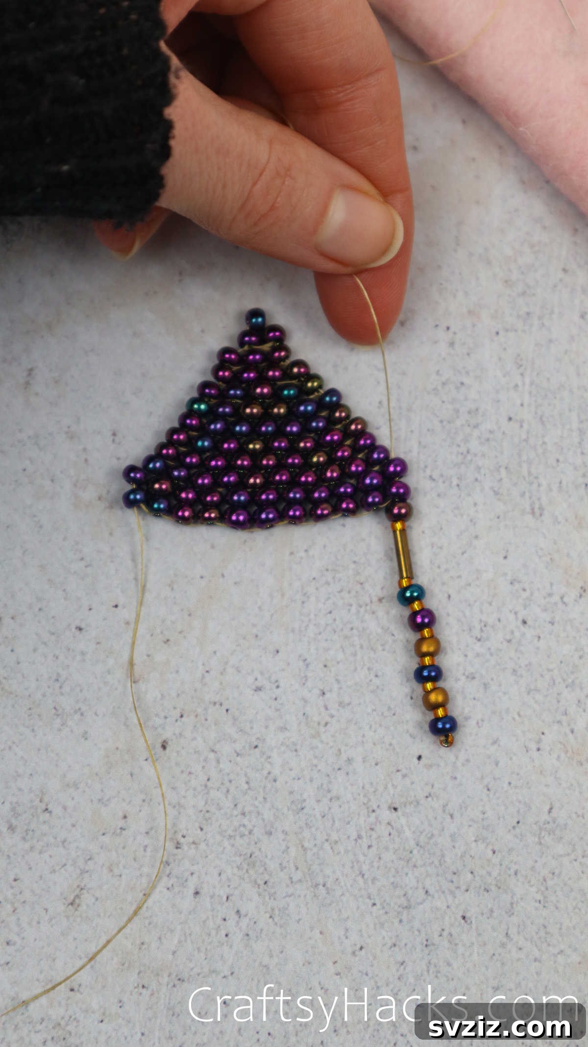 Craft Your Own Beaded Earrings 51 Pulling the thread up and out to tighten a newly added fringe strand.