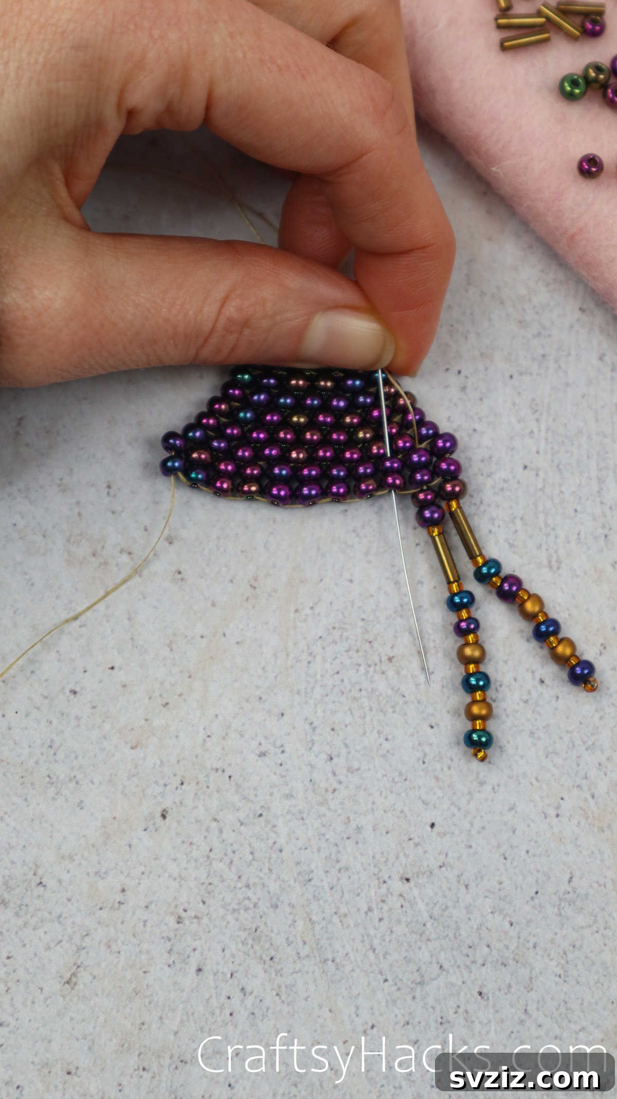 Craft Your Own Beaded Earrings 56 Needle threading through beads to prepare for the next fringe line.
