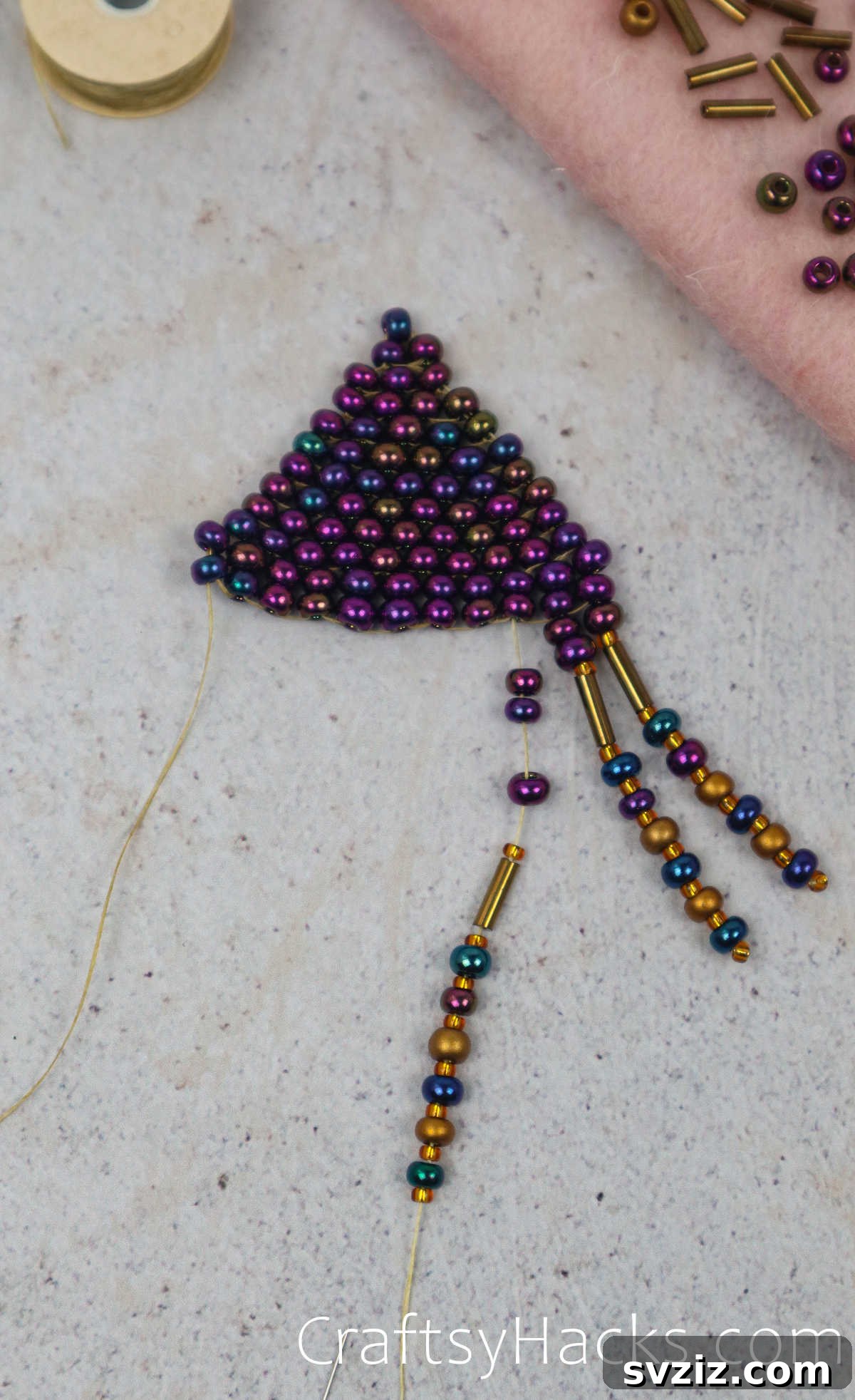 Craft Your Own Beaded Earrings 57 Adding beads to the fringe, demonstrating the gradual increase in length.