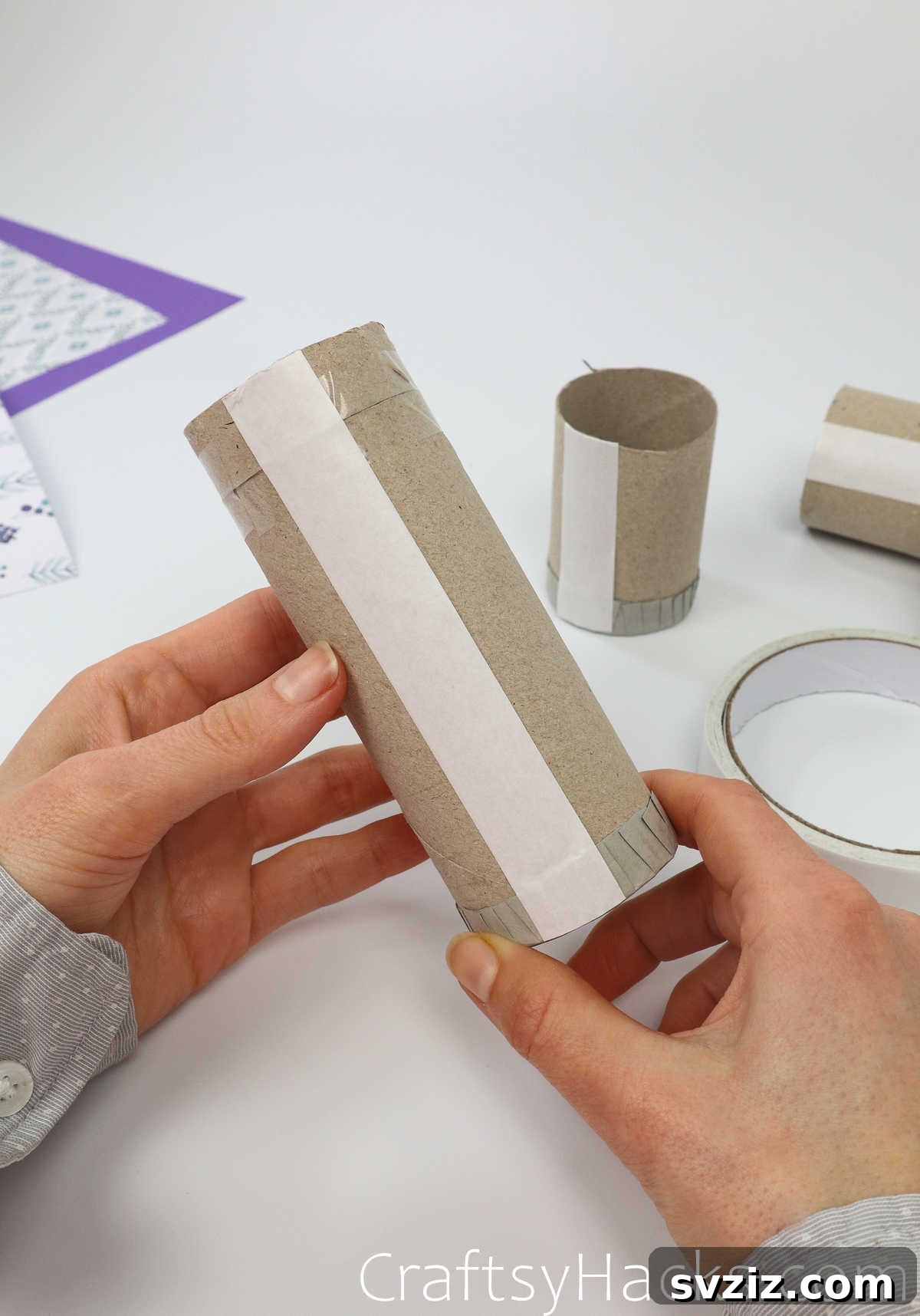 Craft Your Own Makeup Organizer 20 add double sided tape to the length of toilet paper tube