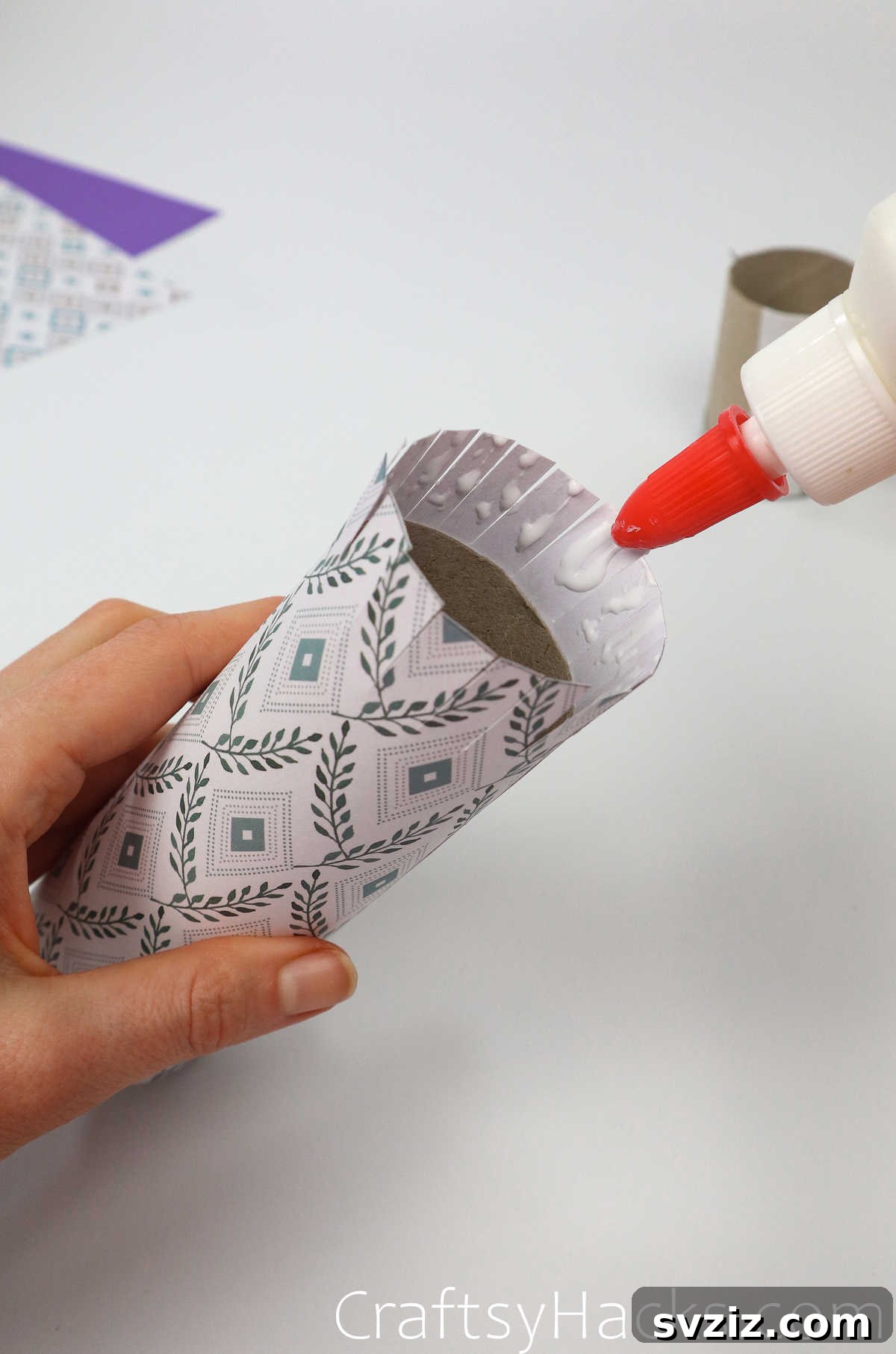 Craft Your Own Makeup Organizer 24 glue the strips on to toilet paper tube