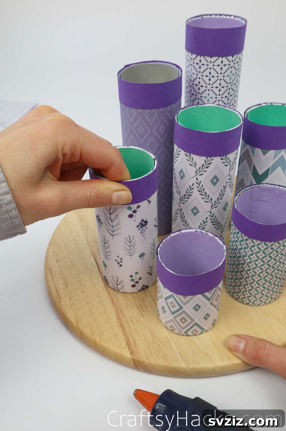Craft Your Own Makeup Organizer 47 attach the toilet paper tube to board