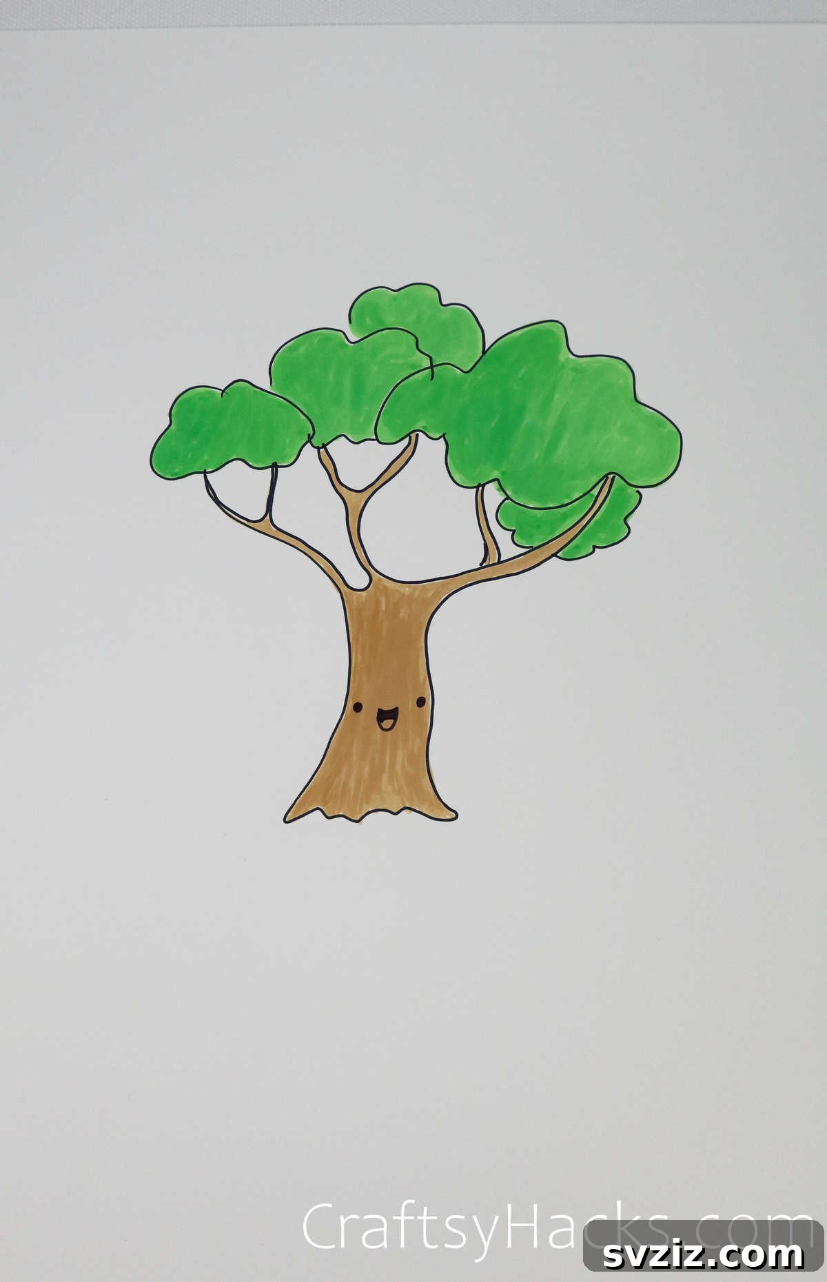 21 Simple Tree Drawing Prompts 12 Whimsical smiley face tree drawing, adding personality to nature art