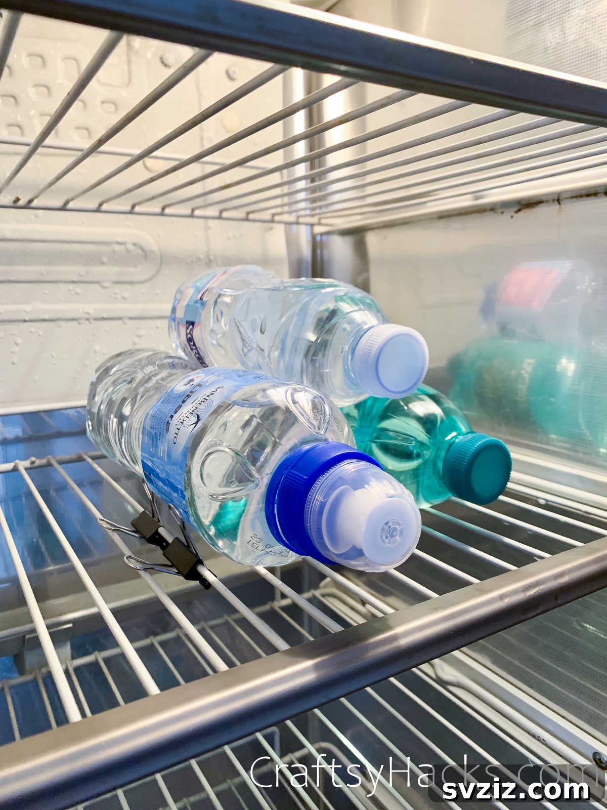 Use binder clips to stop bottles from rolling on refrigerator shelves