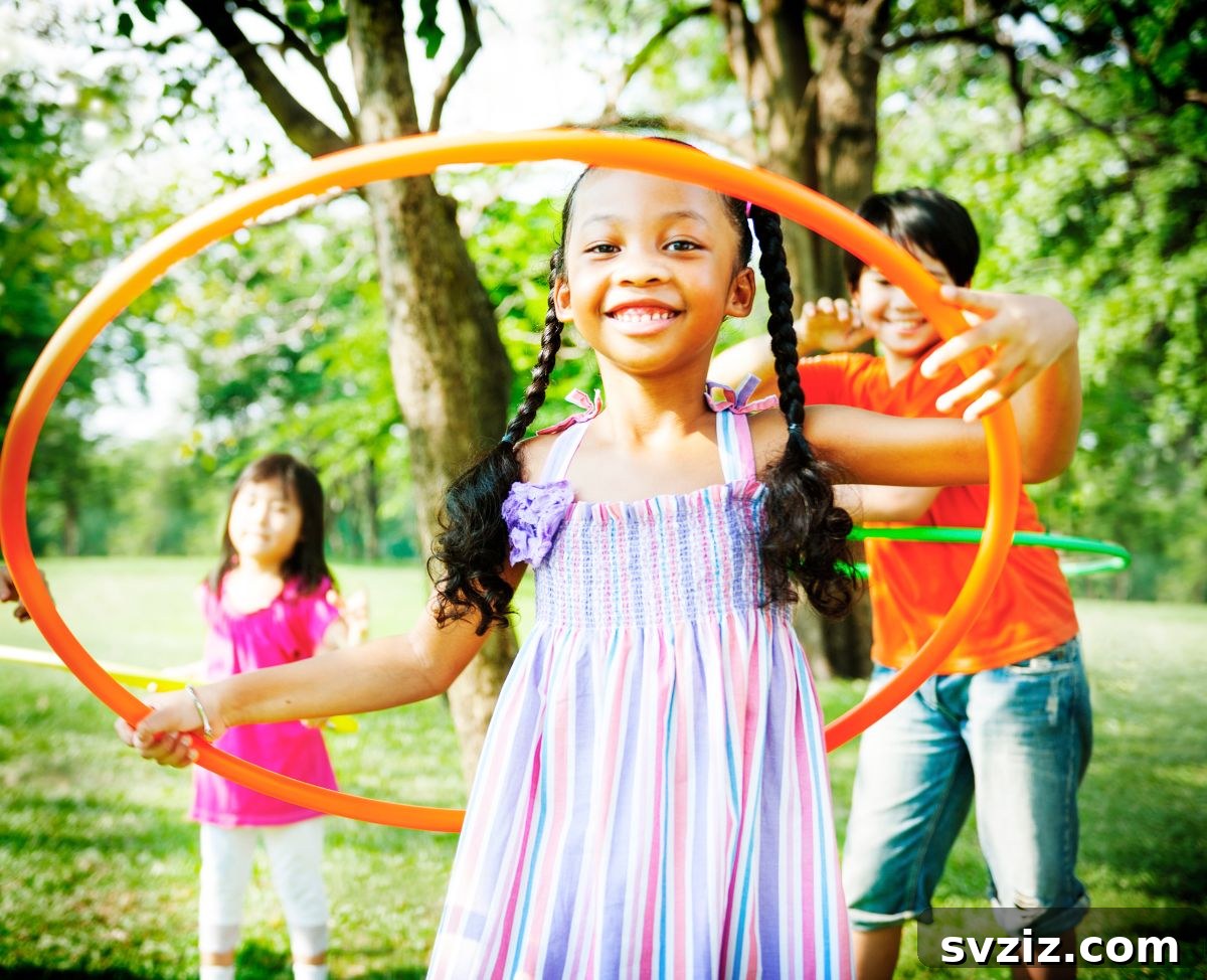 Kids playing Fingertip Hula Hoop, balancing a hula hoop with their fingertips