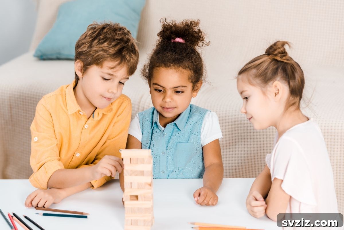 Children collaboratively building the tallest tower with blocks and various materials