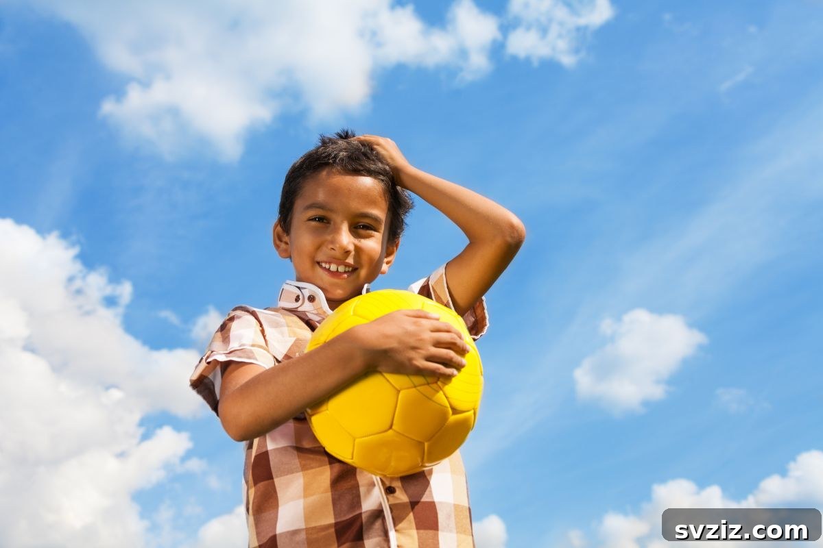 Kids playing Trust Ball, silently passing a lightweight ball around a circle