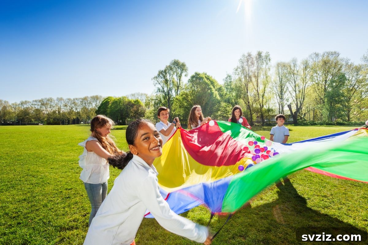 Children happily playing with a colorful parachute in a team building activity