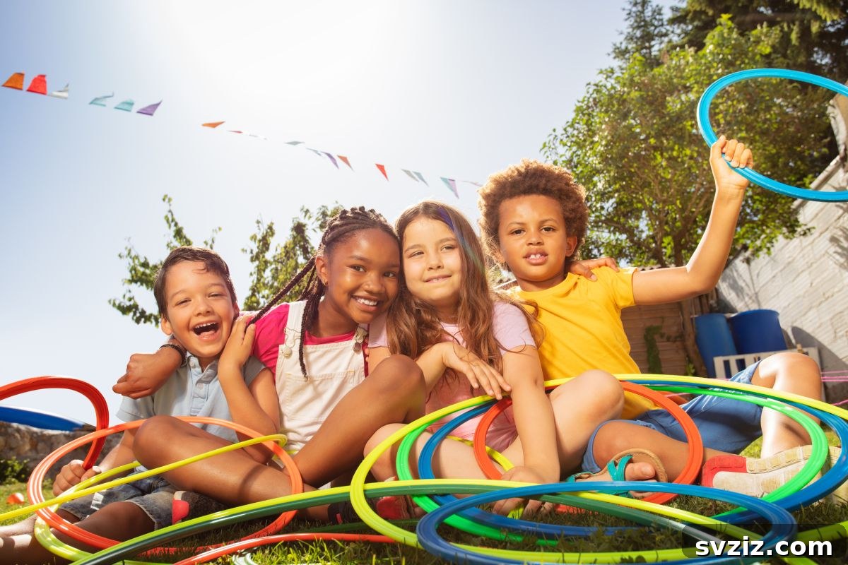 Kids playing Hula Hoop Pass, passing a hula hoop around a circle while holding hands