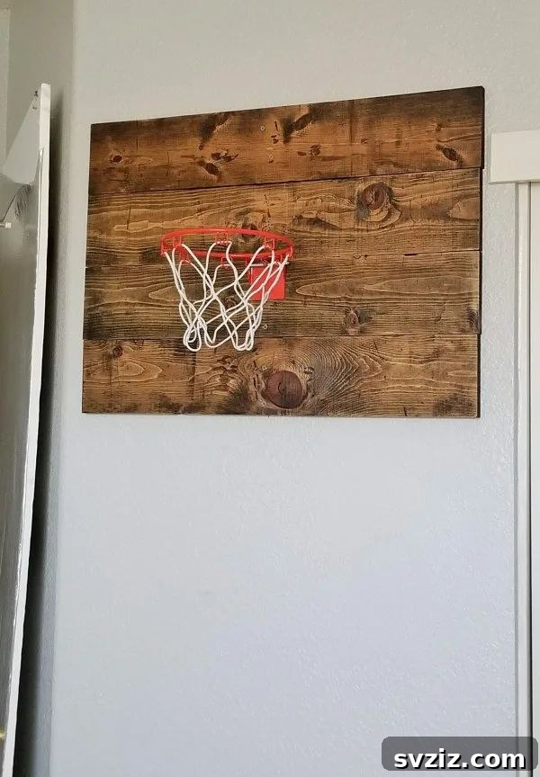 Forge Your Fortress: 17 DIY Man Cave Projects 16 DIY wall-mounted mini basketball hoop for man cave fun