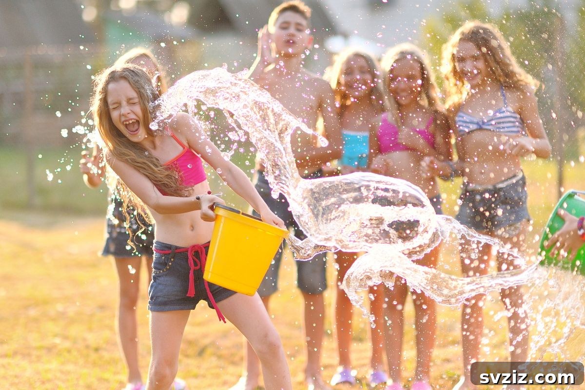 Kids having a water fight in the backyard with water guns