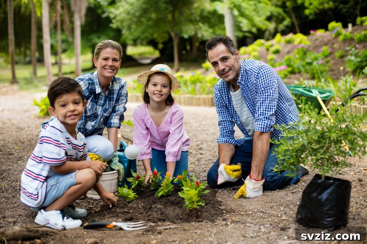 Child and adult gardening together, planting in soil