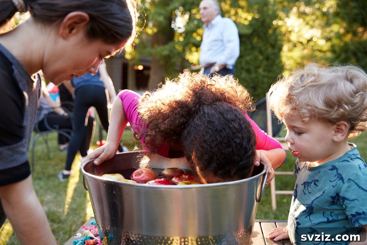 Kid bobbing for apples in a bucket of water