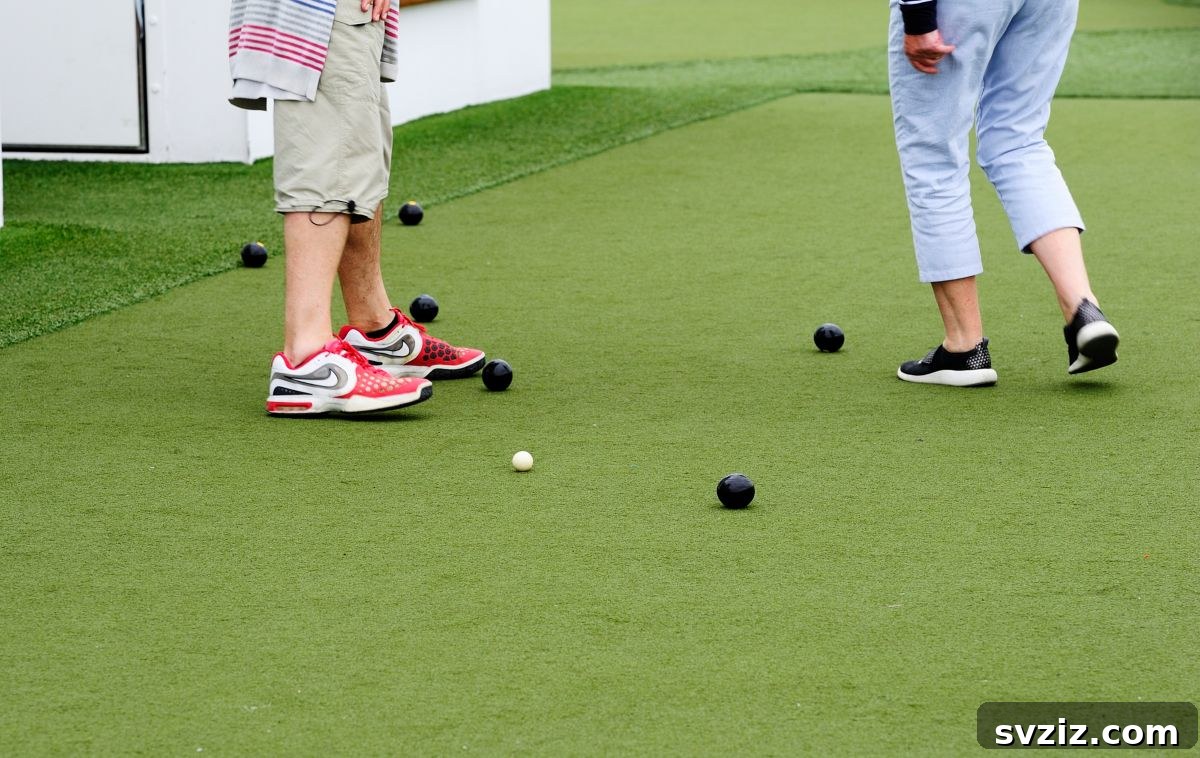 Children playing lawn bowling in the backyard