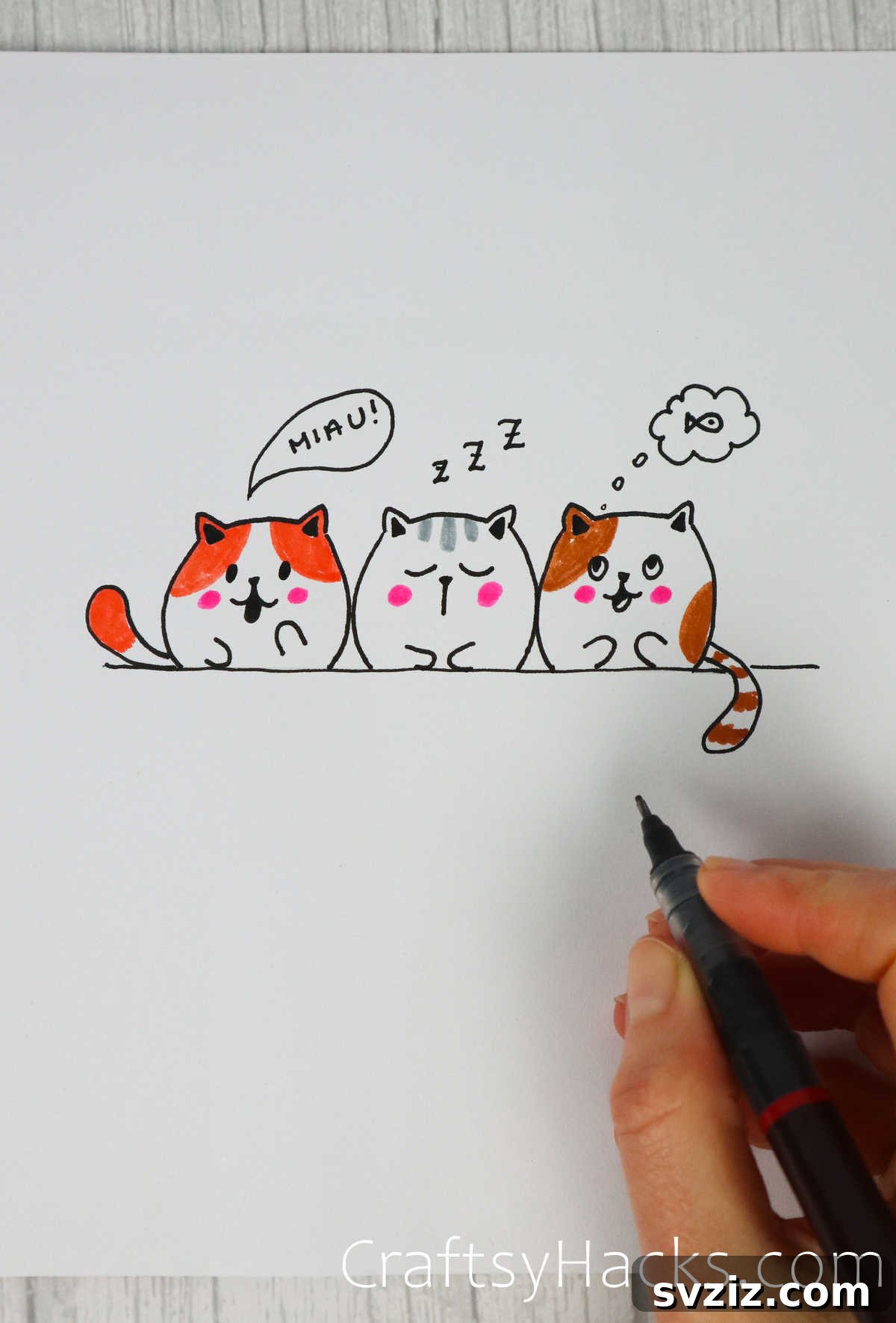 A charming drawing featuring three stylized cats, showcasing easy drawing techniques.