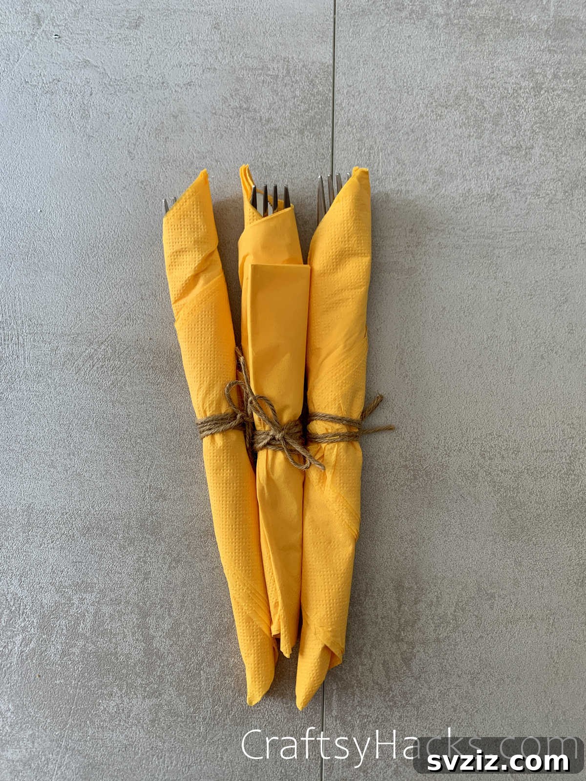 21 Genius Party Tricks 9 Elegantly rolled silverware for a party setting