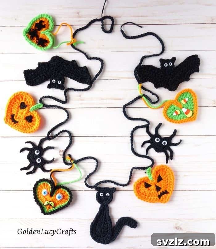 A festive crochet Halloween bunting featuring small, colorful crocheted shapes like pumpkins, ghosts, and bats, strung together.