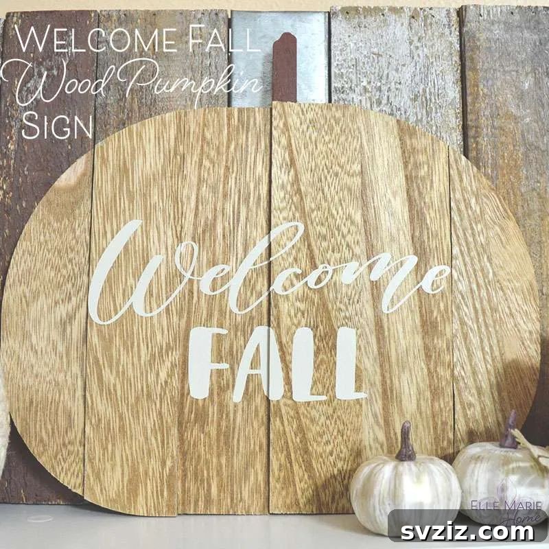 A rustic 'Welcome Fall' wood pumpkin sign, featuring a charming handwritten font and warm autumn colors, ideal for front door decor.