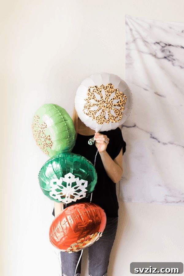 Instant Holiday Cheer: 31 Crafts in Under 15 Minutes 20 Festive snowflake balloons for holiday parties