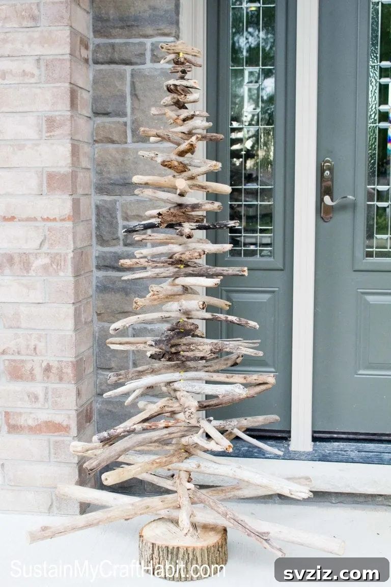 Wooden Holiday Magic: 21 Craft Ideas 18 Unique rustic driftwood evergreen tree for natural holiday decor