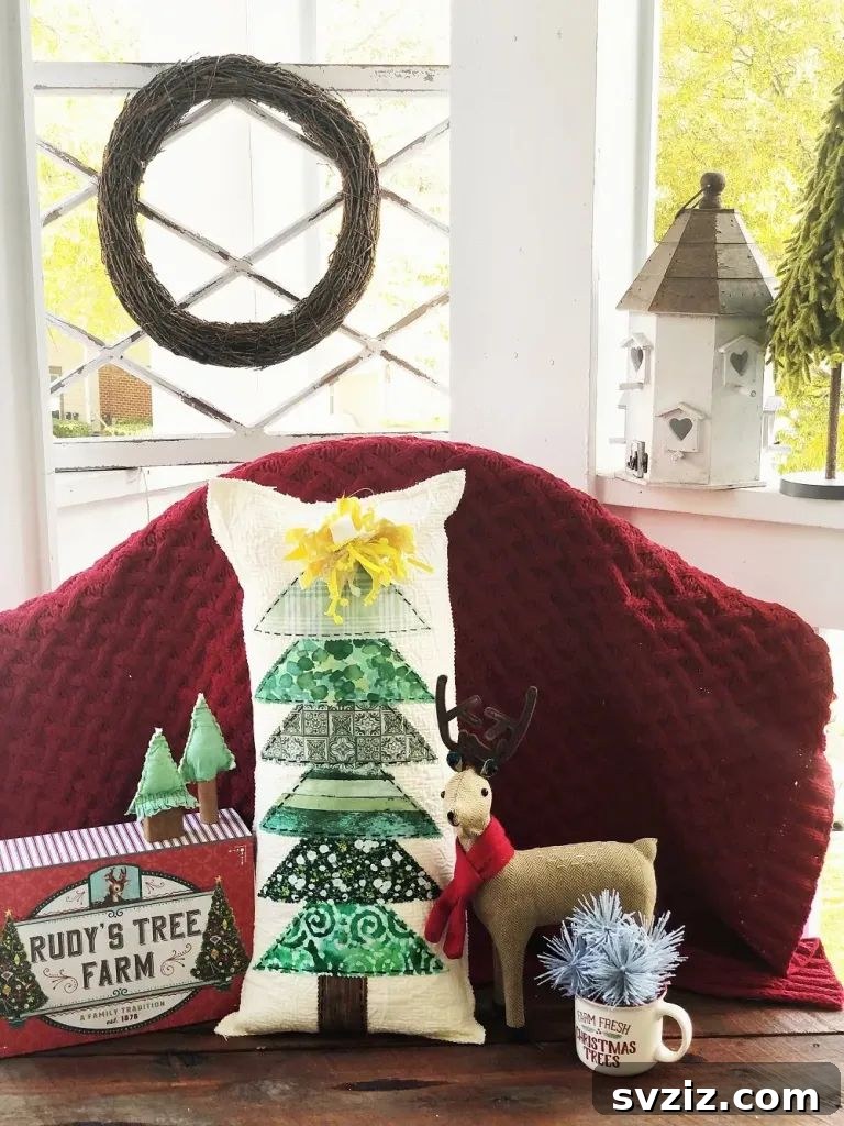 31 Festive DIYs to Deck Your Living Room This Christmas 11 Cozy upcycled Christmas tree pillow, a sustainable and charming DIY living room decor.