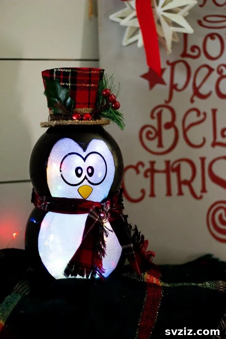 31 Festive DIYs to Deck Your Living Room This Christmas 16 Cute handmade penguin Christmas decoration, bringing playful winter charm to holiday decor.