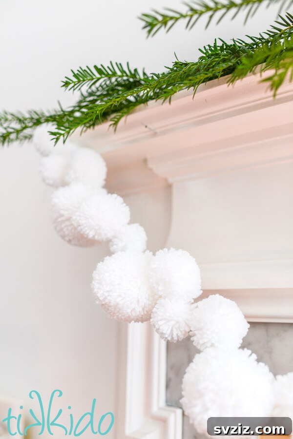 31 Festive DIYs to Deck Your Living Room This Christmas 20 Colorful and fluffy pom-pom garland, a delightful DIY Christmas decoration.