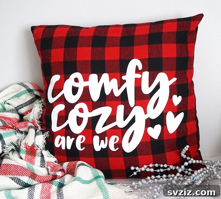 31 Festive DIYs to Deck Your Living Room This Christmas 24 Soft and festive 'Comfy Cozy' Christmas pillow, perfect for adding warmth to living room seating.
