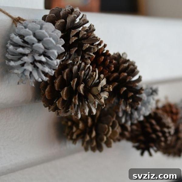 31 Festive DIYs to Deck Your Living Room This Christmas 5 Elegant DIY pinecone garland draped over a mantel, showcasing natural Christmas decor.