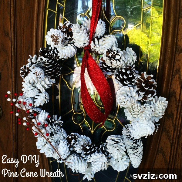 31 Cozy Farmhouse Christmas Inspirations 24 pine cone wreath