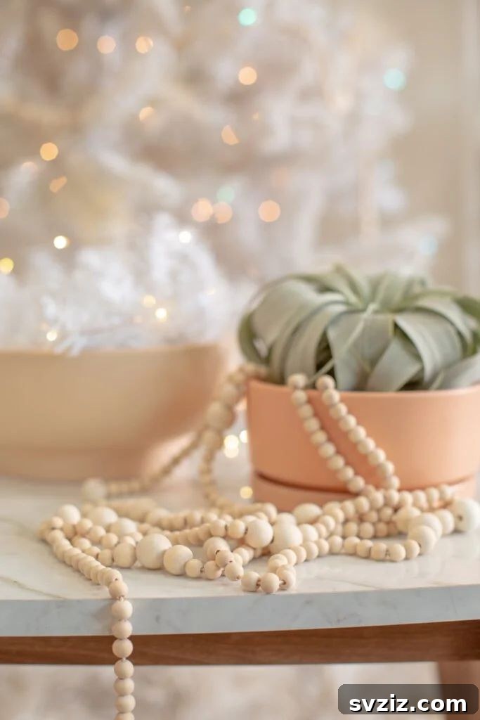 31 Cozy Farmhouse Christmas Inspirations 10 wood bead garland