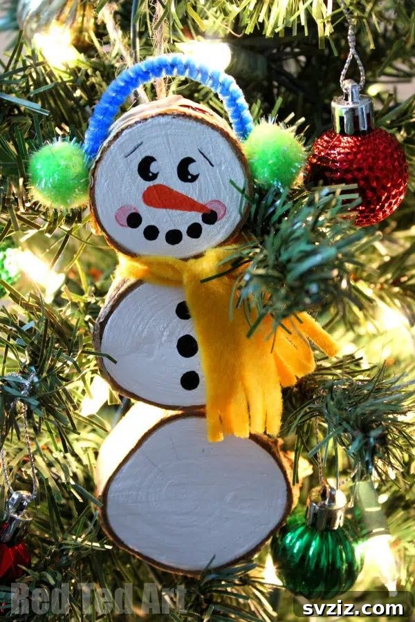 31 Profitable Winter Craft Ideas 20 wood slice snowman ornament