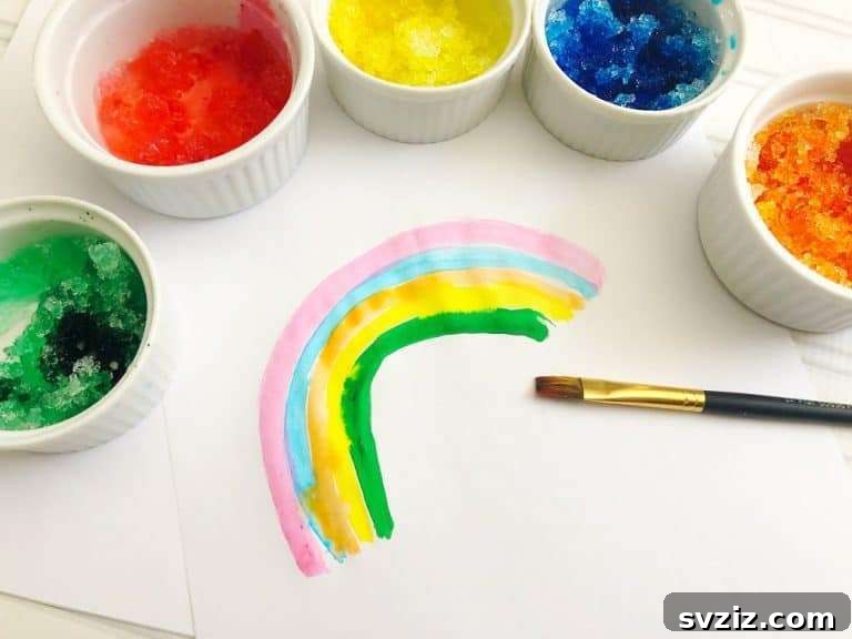 31 Fun Winter Craft Ideas for Little Ones 24 Painting with Snow: Sensory and Creative Winter Experiment for Toddlers