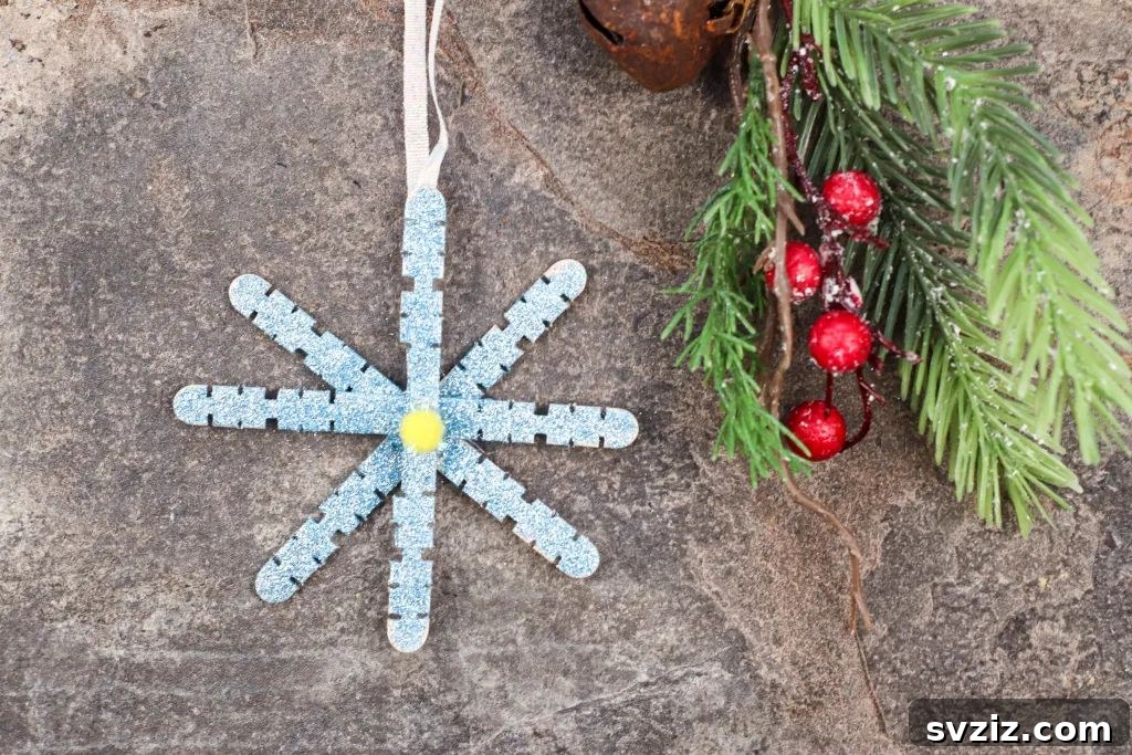 31 Fun Winter Craft Ideas for Little Ones 27 Easy Glitter Popsicle Stick Snowflake Craft: Bright Winter Decor for Kids